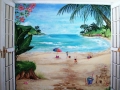 childrens-murals-beach-painted-french-doors-open-to-children-playing-on-the-beach-with-name-sign-above-includes-sand-castle-and-toys-with-a-path-to-the-ocean