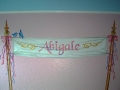 childrens-murals-castle-name-banner-on-poles-decorated-with-ribbons-used-as-a-headboard-over-a-little-girls-bed