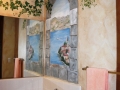 residential-murals-window-master-bath-faux-with-arched-window-and-vines-looking-to-como-lake